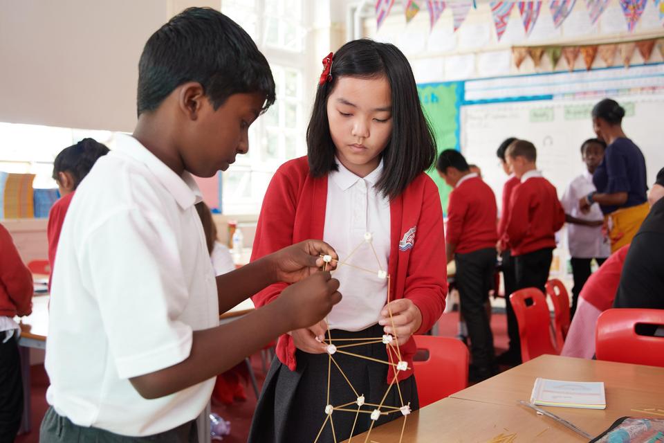 Pupils making a model